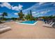 Outdoor swimming pool with plenty of seating at 2625 Pine Lake Ter # B, Sarasota, FL 34237