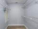 Walk-in closet featuring white wire shelving for optimal storage and organization at 2720 60Th Avenue W Dr # D, Bradenton, FL 34207