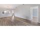 Spacious living area featuring vaulted ceilings, wood-look floors, and an open layout at 2720 60Th Avenue W Dr # D, Bradenton, FL 34207