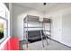 Cozy bedroom featuring a loft bed with a desk, offering a functional and efficient space at 2877 Sultan Ct, North Port, FL 34286