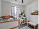 Bright bedroom with a bunk bed, fun decor, and wall-mounted TV for entertainment at 2877 Sultan Ct, North Port, FL 34286
