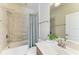 Bathroom with a bathtub shower combo and vanity at 324 Whispering Palms Ln, Bradenton, FL 34212