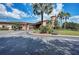 Exterior shot of the clubhouse showing the landscaping at 324 Whispering Palms Ln, Bradenton, FL 34212