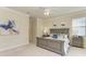 Comfortable main bedroom with neutral tones and a large window at 324 Whispering Palms Ln, Bradenton, FL 34212