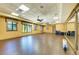 Bright, expansive studio with wood floors, large windows, ceiling fans and mirrors offers versatile space at 324 Whispering Palms Ln, Bradenton, FL 34212
