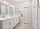 Bright bathroom featuring a double vanity, modern mirrors, and a clean, contemporary design at 4155 Cascade Falls Dr, Sarasota, FL 34243