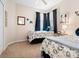 Charming bedroom with two twin beds, coastal decor, and plenty of natural light at 4155 Cascade Falls Dr, Sarasota, FL 34243