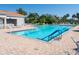 Large community pool with lane markers and a clear view of the water, perfect for swimming and recreation at 4155 Cascade Falls Dr, Sarasota, FL 34243