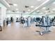 Bright gym features various weight machines, treadmills, and mirrored walls at 4155 Cascade Falls Dr, Sarasota, FL 34243