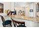 Charming kitchen with granite counters, stainless steel faucet, and seating at the breakfast bar at 4155 Cascade Falls Dr, Sarasota, FL 34243