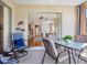 Relaxing outdoor patio with comfortable seating and a view through the sliding glass doors at 4155 Cascade Falls Dr, Sarasota, FL 34243