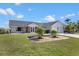 Charming home featuring a well-manicured lawn and a two-car garage at 4196 Eastlake Ct, Port Charlotte, FL 33948