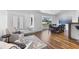 Stylish and modern living area connected to dining room with an abundance of natural light at 4196 Eastlake Ct, Port Charlotte, FL 33948