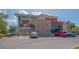 Modern exterior of the Gulf Gate Library featuring stone and metal accents, ample parking at 4340 Kingston Loop, Sarasota, FL 34238