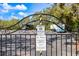 Las Palmas recreational vehicle parking lot gate with warning sign for injury and death to park vehicles at 5552 Bentgrass Dr # 7-116, Sarasota, FL 34235