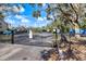 Las Palmas recreational vehicle parking lot gate with warning sign for injury and death to park vehicles at 5552 Bentgrass Dr # 7-116, Sarasota, FL 34235