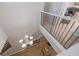 Second floor shot of the entryway with wood floors, overlooking the chandelier at 5552 Bentgrass Dr # 7-116, Sarasota, FL 34235