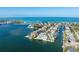Panoramic aerial view of waterfront homes on canals, boasting private boat docks and Gulf access at 624 N Point Dr, Holmes Beach, FL 34217