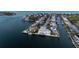 Aerial view showcases waterfront homes along canals, each with a private dock and easy ocean access at 624 N Point Dr, Holmes Beach, FL 34217
