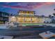 Beautiful backyard with waterfront pool, deck, and outdoor seating perfect for entertaining guests at 624 N Point Dr, Holmes Beach, FL 34217