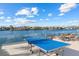 Outdoor recreation area with a ping pong table and waterfront view at 624 N Point Dr, Holmes Beach, FL 34217