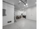 Spacious garage with epoxy flooring, ample storage, and room for multiple vehicles and bikes at 624 N Point Dr, Holmes Beach, FL 34217
