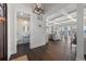 Open concept interior with kitchen, dining, and living space. Access to half-bath at 624 N Point Dr, Holmes Beach, FL 34217