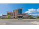 Front view of Gulf Gate Library, featuring modern architectural design and ample parking spaces at 7272 Cass Cir, Sarasota, FL 34231