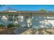 Charming single-story home featuring a front entrance with well-kept landscaping at 7272 Cass Cir, Sarasota, FL 34231