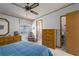 Bedroom with a large window, with a view to the bathroom and closet at 8449 Imperial Cir, Palmetto, FL 34221