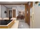 Bright kitchen featuring white tile flooring, an island cooktop, and dining area at 8449 Imperial Cir, Palmetto, FL 34221