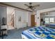 Spacious main bedroom features an ensuite bathroom and lots of natural light from the mirror sliding doors at 8449 Imperial Cir, Palmetto, FL 34221