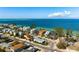 Beautiful aerial view of a beach neighborhood close to the water, beaches, and nearby homes at 912 N Shore Dr, Anna Maria, FL 34216