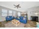 Spacious living room featuring wood floors and an open concept design at 11330 80Th E St, Parrish, FL 34219