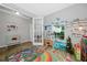 Charming playroom area with colorful decor and play kitchen at 11330 80Th E St, Parrish, FL 34219