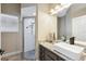 Bathroom featuring a walk-in shower, granite countertops, modern sink, and tile flooring at 1314 Brambling Ct, Bradenton, FL 34212