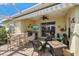 Inviting lanai with grill, barstool seating, and a cozy seating area at 1407 Morning Sky Gln, Bradenton, FL 34208