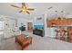 Bright living space offering an open layout with views of the kitchen and access to the dining area at 1407 Morning Sky Gln, Bradenton, FL 34208