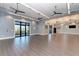 Multipurpose hall featuring wood floors and natural lighting at 16741 Ellsworth Ave, Bradenton, FL 34202