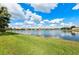 A sprawling lake view showcases the verdant landscape at 16741 Ellsworth Ave, Bradenton, FL 34202