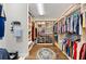 Spacious walk-in closet with custom shelving and ample storage space at 16741 Ellsworth Ave, Bradenton, FL 34202