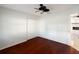 Bedroom with hardwood floors, closet, and plenty of natural light at 222 Pine Glen Ct, Englewood, FL 34223