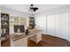 Bedroom featuring a ceiling fan, closet, and plenty of natural light at 222 Pine Glen Ct, Englewood, FL 34223