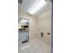 Laundry room with tile flooring and washer and dryer hookups for your convenience at 222 Pine Glen Ct, Englewood, FL 34223
