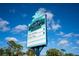 Public parking and Pioneer Plaza sign at the intersection of West Dearborn Street in Englewood, Florida at 222 Pine Glen Ct, Englewood, FL 34223