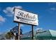Street sign for Rehab Vintage Gallery on Dearborn Street in Englewood, Florida at 222 Pine Glen Ct, Englewood, FL 34223