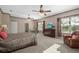 Spacious bedroom with large windows, carpet flooring, and a makeup vanity at 25605 69Th E Ave, Myakka City, FL 34251