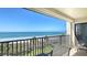 Relax on the balcony with views of the beach and ocean at 2675 Gulf Of Mexico Dr # 301, Longboat Key, FL 34228