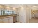 Well-equipped kitchen with stainless steel appliances, granite counters, and scenic ocean views at 2675 Gulf Of Mexico Dr # 301, Longboat Key, FL 34228