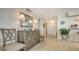 Comfortable seating area with storage in hallway, closet doors visible at 2675 Gulf Of Mexico Dr # 301, Longboat Key, FL 34228